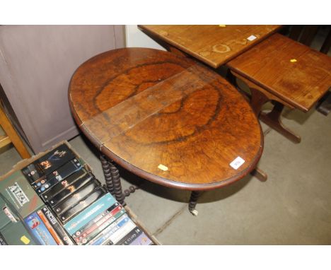 A dropleaf table raised on bobbin turned supports