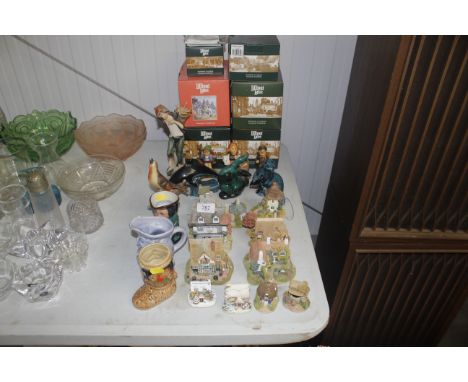 A collection of Lilliput Lane model houses; Goebel figures; Poole pottery ornaments etc.