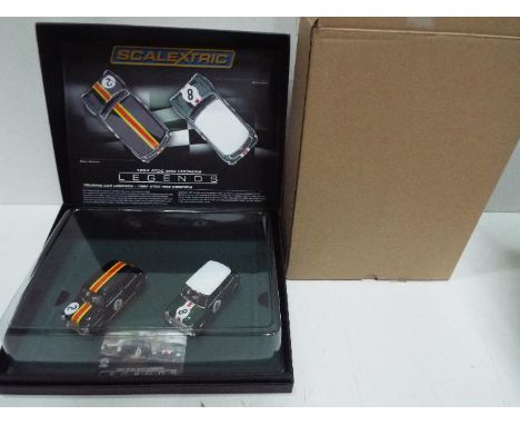 Scalextric - 1964 ATCC Mini Cooper set # C3586A with two Mini Cooper models and a card to show this is number 1235 of 3000 pr