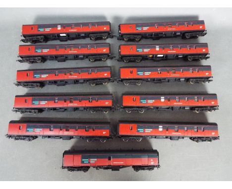 Lima, Bachmann - A rake of 11 unboxed OO gauge Royal Mail Express Systems van. The lot predominately comprises of Lima #30534