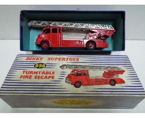 Dinky Toys - A boxed Dinky Toys #956 Turntable Fire Escape. The model in red with cast hubs, silver platform, chrome ladders,