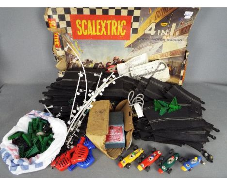Scalextric - a Scalextric 4 in 1 (4 lane ) racing set, all four cars in the box, unchecked for completeness, boxed