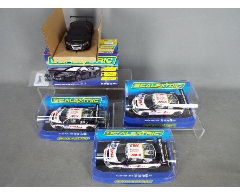 Scalextric - 4 x Audi R8 LMS models including 3 x numbered limited edition Hornby Visitors centre models and a plain black ca