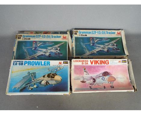 Hasegawa - A fleet of four boxed vintage 1:72 scale plastic model aircraft kits from Hasegawa. Lot consists of K14 Grumman EA