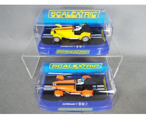 Scalextric - 2 x Caterham 7 limited edition slot cars. # C3425 Collector Centre edition number 1076 of 1500, # C3436 Scalextr