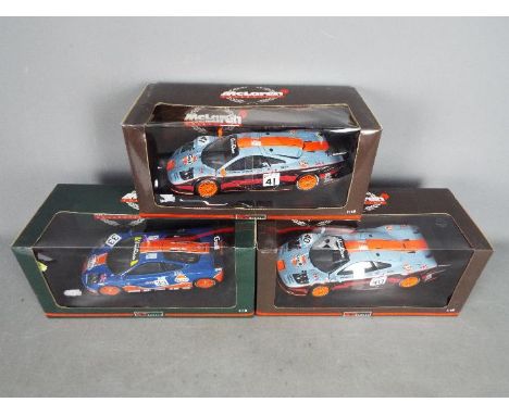 UT Models - 3 x McLaren F1 GTR Le Mans cars in 1:18 scale. # 39726, # 39727, # 161833. All three cars are in different Gulf r