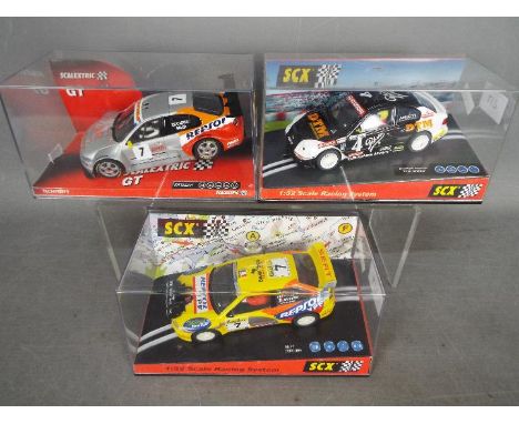 Scalextric - SCX - 3 x boxed slot cars, # 6301 Seat Toledo GT, # 60460 Seat Cordoba, # 60850 Hyundai Accent. All models appea