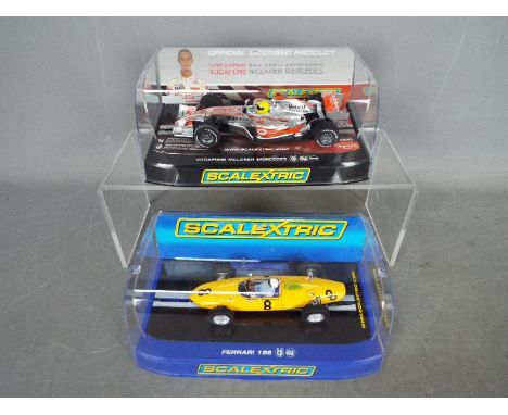 Scalextric - Ferrari 156 # C3033 and McLaren Mercedes MP4-21 Lewis Hamilton car # C2865. The models appear Mint in Near Mint 