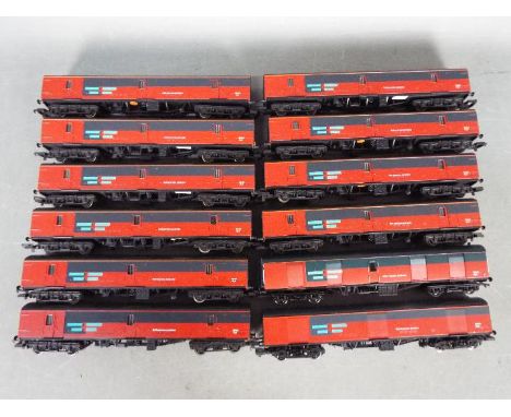 Lima, Bachmann - A rake of 12 unboxed OO gauge Royal Mail Express Systems van. The lot predominately comprises of Lima #30561