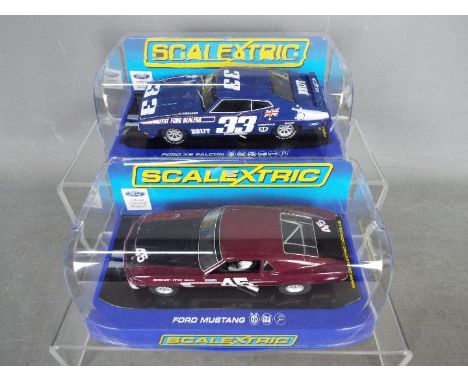 Scalextric - Ford Mustang # C3424 and Ford XB Falcon Bathurst 1974 # C3402. Both cars appear Mint in Near Mint perspex displa