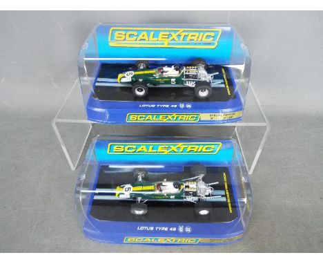 Scalextric - 2 x Lotus Type 49 Jim Clark limited edition models # C3222, numbers 894 and 1183 out of only 1500 produced. The 