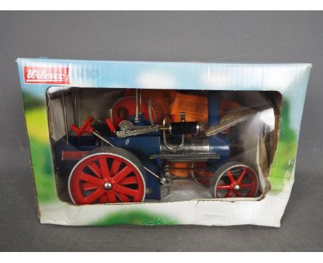 Wilesco - A boxed Wilesco D405 Steam Roller Traction Engine. The model appears to be in Excellent condition housed in a Fair 