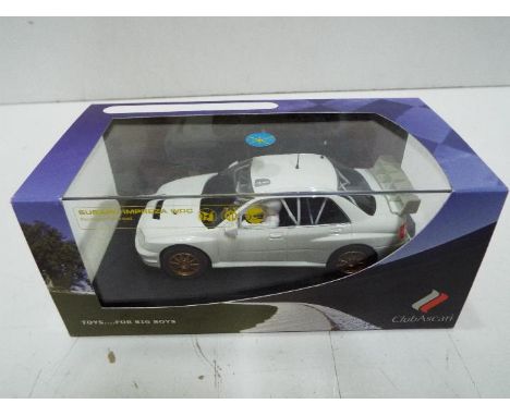 Scalextric - Subaru Impreza WRC limited edition in plain white. This is a promotional model given to members of Club Ascari a