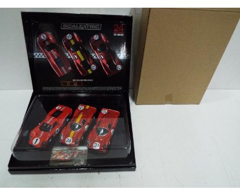 Scalextric - 1967 Le Mans Ferrari / Ford limited edition triple pack including Ford MkIV and 2 x Ferrari 330 P4 models. This 