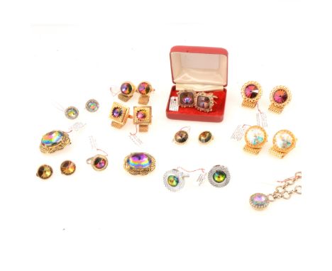 Faux tourmaline "watermelon" jewellery in the style of Elsa Schiaparelli, a pair of large oval gilt metal earrings set with 2