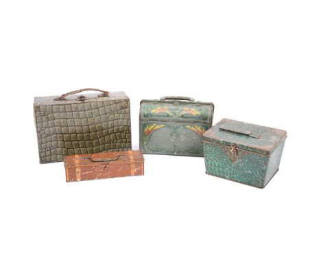 Four biscuit tins in the form of suitcases and bags; including three Huntley &amp; Palmers; and a Turnwright's Toffee De-Ligh