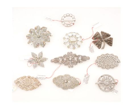 Ten vintage white metal past set brooches, mostly 1930's, 1940's, a quatrefoil flower set with square paste and numbered N230