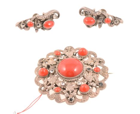 1930's brooch and earrings set with faux coral in the style of Max Neiger, 45mm circular brooch with large cabochon to centre