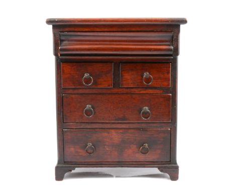 Victorian mahogany and stained wood 'apprentice piece' table-top Scotch chest of drawers, moulded frieze drawer above two sho