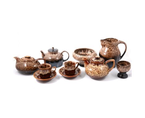 A dark brown Fosters tea set, comprising teapot (15cm), water jug, milk jug, pedestal bowl, cups and saucers; and a treacle-g