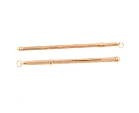 Two 9 carat gold cocktail swizzle sticks, both engine turned design, hexagonal, by Deakin &amp; Francis, Birmingham 1955, 9cm