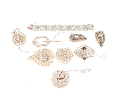 A collection of 1930's clear paste costume jewellery, 20mmwide panel bracelet, 17.5cm, paisley brooch with a cluster of oval 