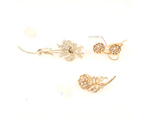 Three vintage paste set floral brooches, signed Hattie Carnegie twin flower gilt metal brooch set with clear aurora paste, 65