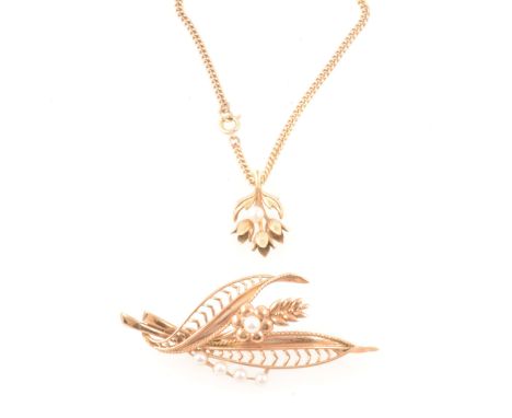 A yellow metal leaf spray brooch set with five cultured pearls, marked 9ct, 55mm, 6.6gm, a 9 carat yellow gold pendant, 20mm 