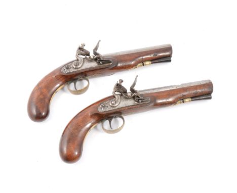 W &amp; S.R A pair of flint lock brass mounted pistols With octagonal sighted barrels each stamped ‘W &amp; S.R’. Engraved ta