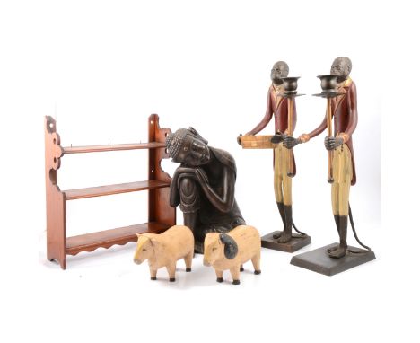 A pair of cast metal monkey figures, one holding two torches for candles, one holding a basket, 42cm; a small pine cabinet, w