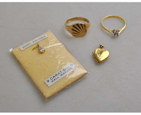 A lot containing a gent's 9ct signet ring, gilt metal heart shaped locket, cubic zirconia single stone pendant, 18ct single s