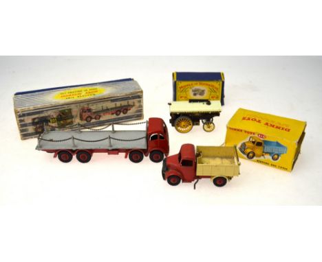 A boxed Dinky Supertoys Foden Flat Truck with Chains 905, to/w a Bedford End Tipper 410 and a Lesney Models of Yesteryear Tra