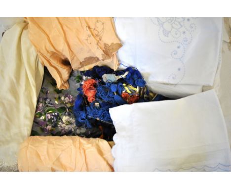 A box containing six peach silk cami-knickers and a cream silk half-slip, a piece of 1950s floral printed fabric, to/w a pair