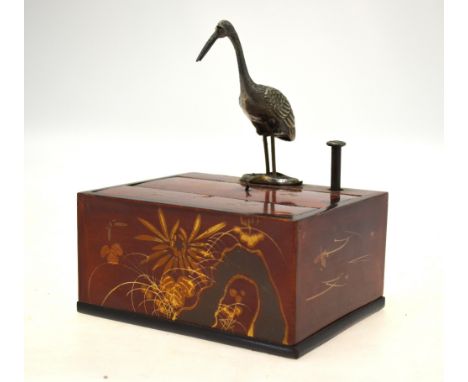 An oriental novelty cigarette box with automaton stork 'picker', 14 cm wide