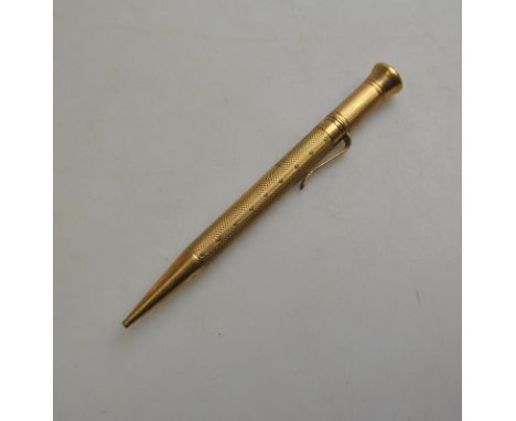 A 9ct yellow gold engine turned propelling pencil by Mordan Everpoint, stamped SM&Co Condition Report Bruised