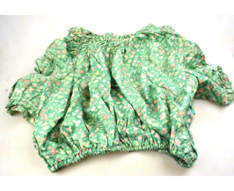 A box of vintage children's clothing to include; floral printed silk dress and matching bloomers, green silk slip, lace edged