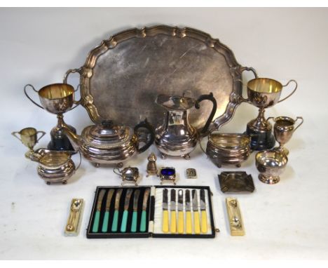 An electroplated oval tray, four-piece tea service, trophy cups, etc. (box)