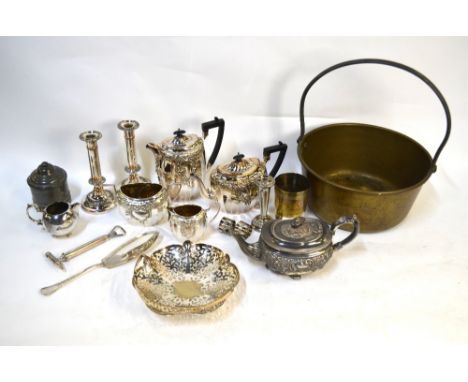 A four-piece tea service, a pair of candlesticks and other plated items, to/w a brass preserving pan (box)