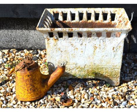 An antique cast iron planter with all-round flared pierced neck to/w a Wells Unbreakable can (2)