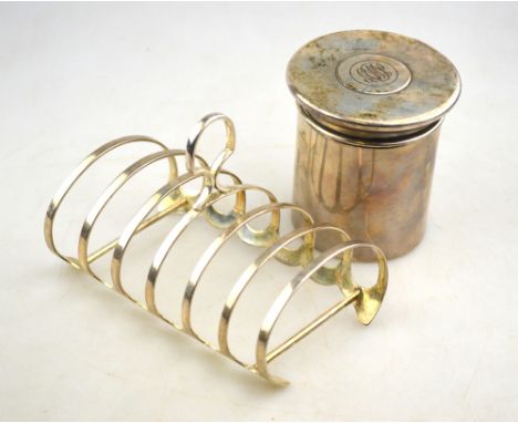 A cylindrical pot and cover, James Dixon & Sons, Sheffield 1911, 8 cm high, to/w a six-division toast-rack, William Hutton & 