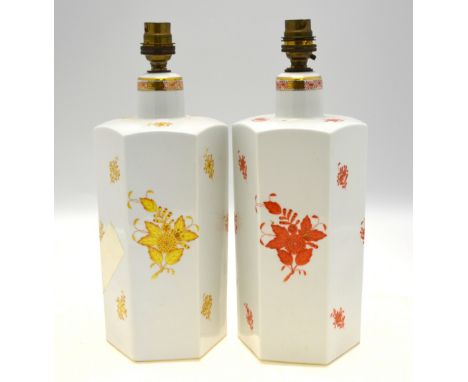 Two Herend porcelain hexagonal table lamp bases, one decorated with iron red floral sprays and sprigs, the other with a simil