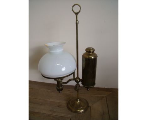 Late Victorian copper paraffin lamp with central stand reservoir and opaque glass shade (height 55cm)