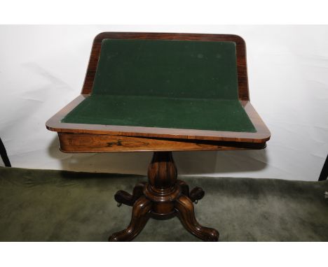 Victorian rosewood fold over card table with central fluted column with four out splayed supports (width 93cm)