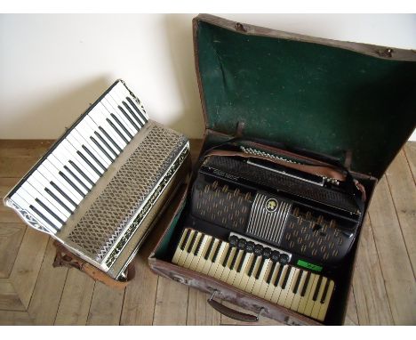 Cased multi grand piano accordion and a Hohner piano accordion (2)