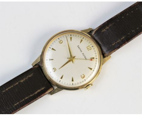 A Gent?s vintage Smith Astral 9ct gold wristwatch, the circular cream dial with Arabic numerals and tapered baton markers, se