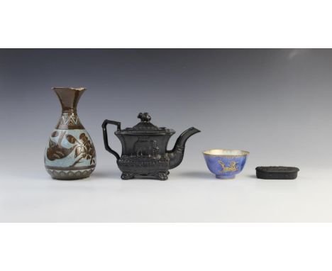 A black basalt teapot and cover, early 19th century, of waisted rectangular form, the body with relief moulded panels depicti