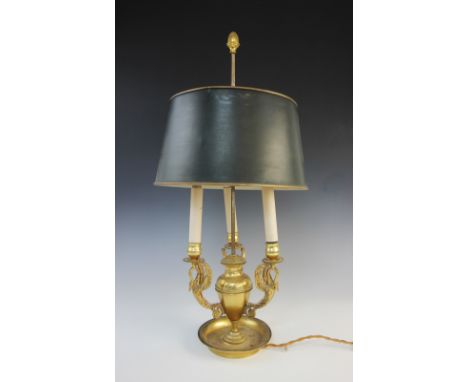 A Regency style ormolu student's lamp, modelled as a central vase issuing three swan form branches, 65cm high Provenance: Ruy