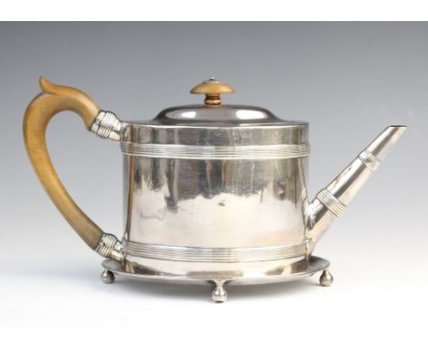 A George III silver teapot and stand, Henry Green London 1787, the teapot of oval form with reeded banding to the body, spout