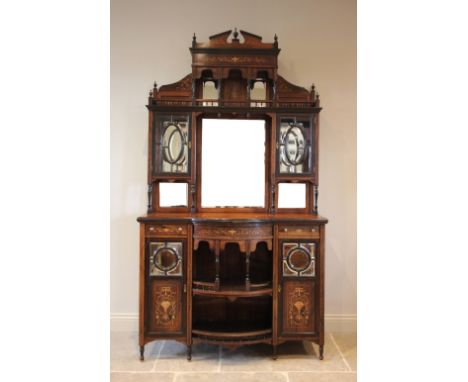 A late Victorian rosewood mirror back chiffonier, the architectural high back with a broken pediment over an arcaded and spin