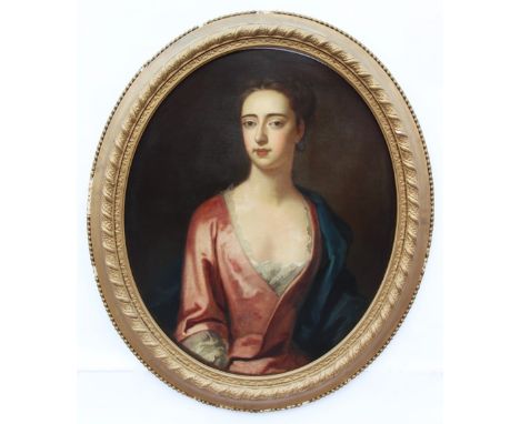 Circle of Sir Godfrey Kneller (1646-1723),Portrait of a young lady, half length, wearing a pink dress and a blue cloak,Oil on